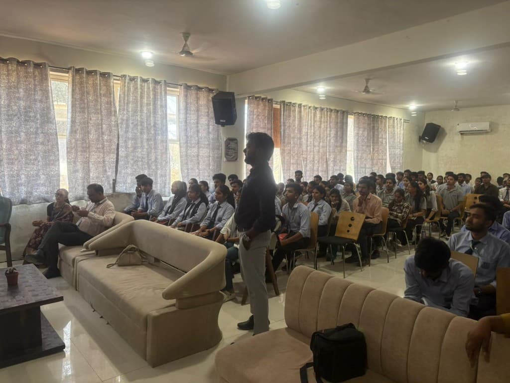 Live seminar session with students and facilitator on the floor